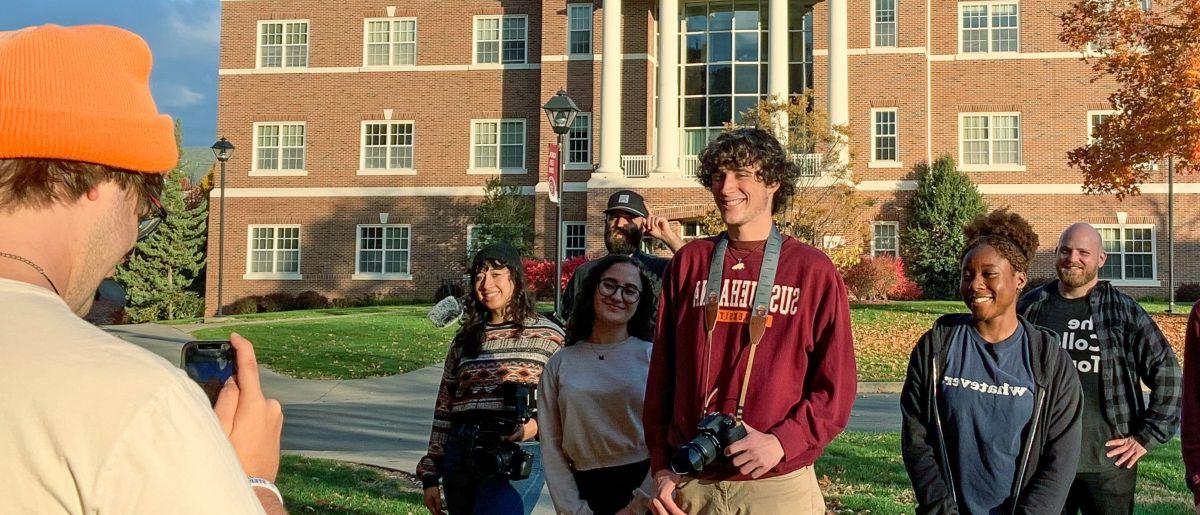 Image of videographer filming students for Amazon Prime's The College Tour.